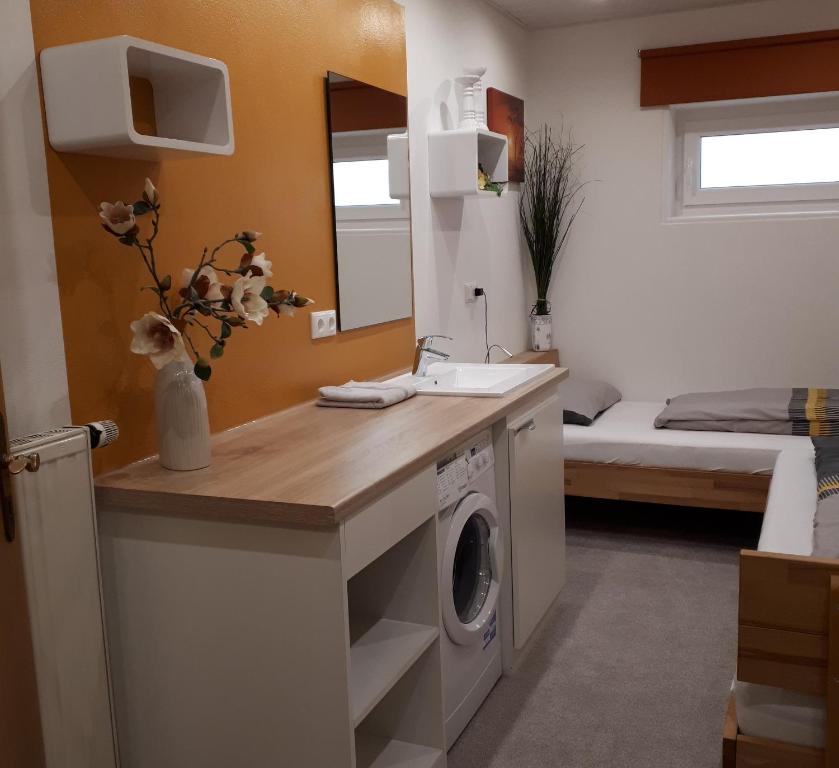 Kuchyň nebo kuchyňský kout v ubytování Ferienwohnung Weigert