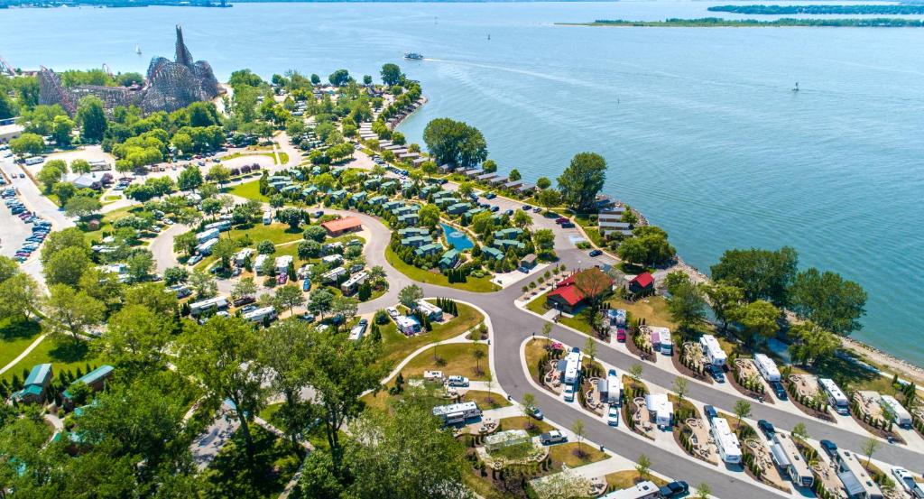 an aerial view of a parking lot next to the water at Cedar Point's Lighthouse Point in Sandusky