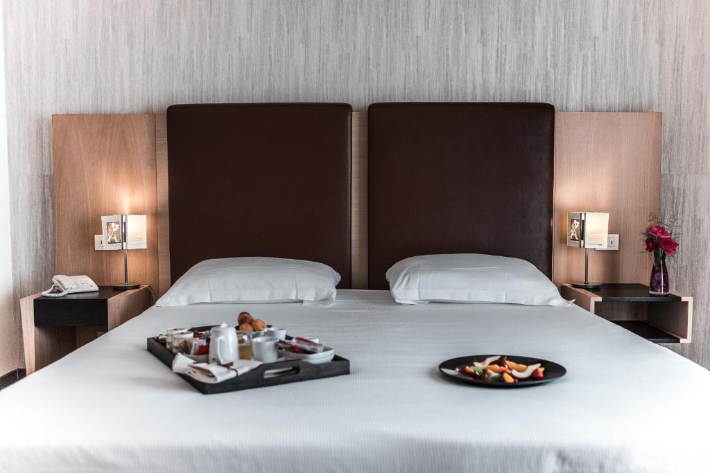 Katil atau katil-katil dalam bilik di Hotel Fontermosa