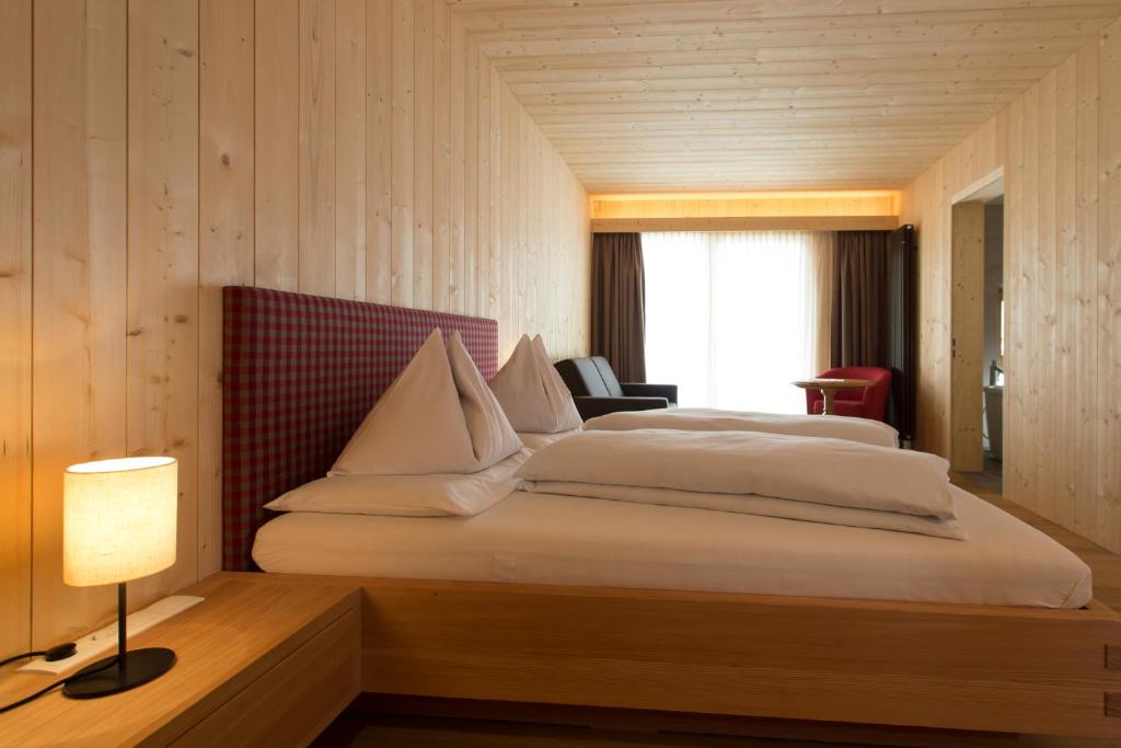 Postel nebo postele na pokoji v ubytování Hotel Schoenblick