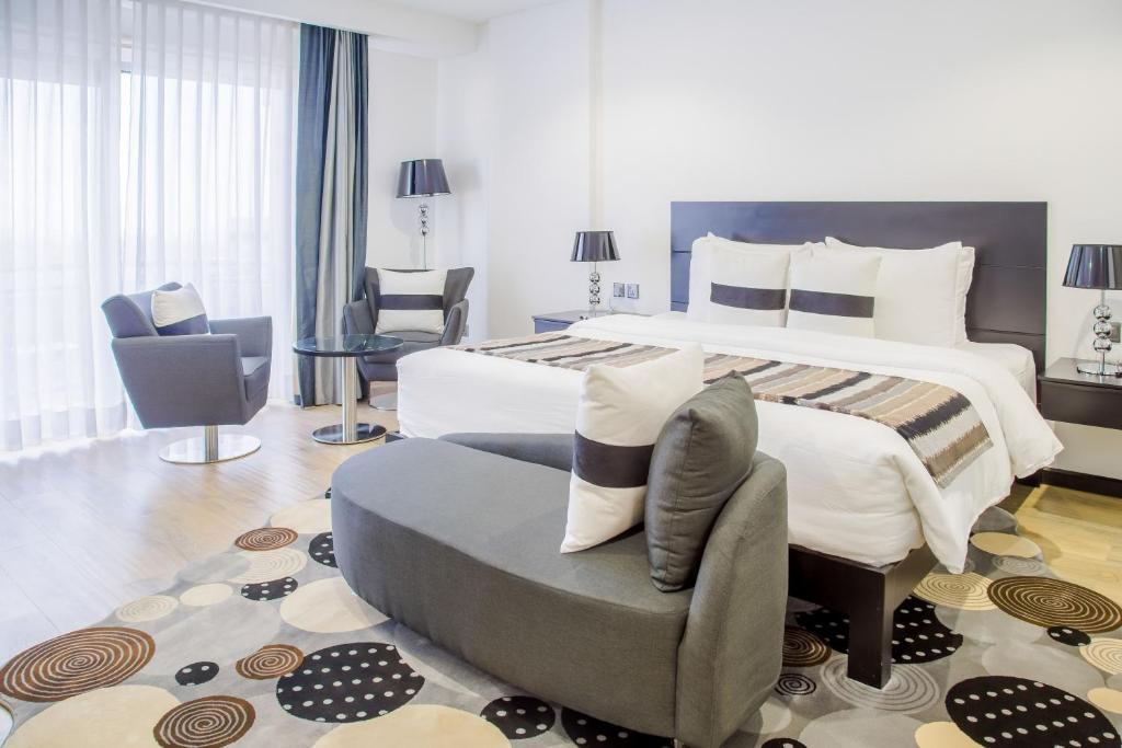 Postel nebo postele na pokoji v ubytování Amaryllis Hotel Blantyre