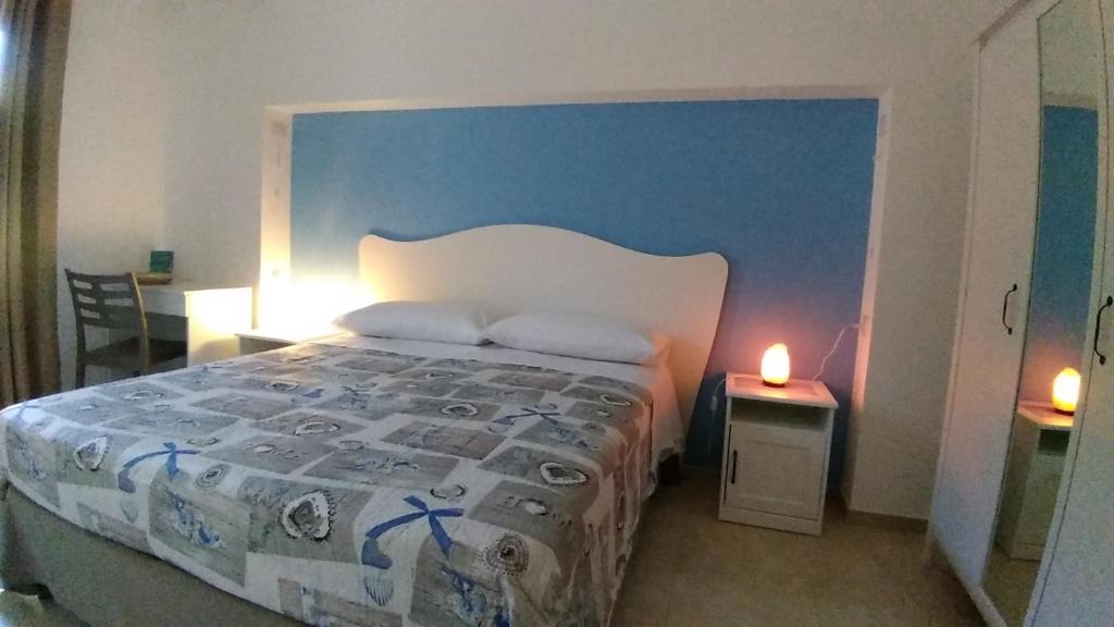 A bed or beds in a room at Acqua e Sale Avola