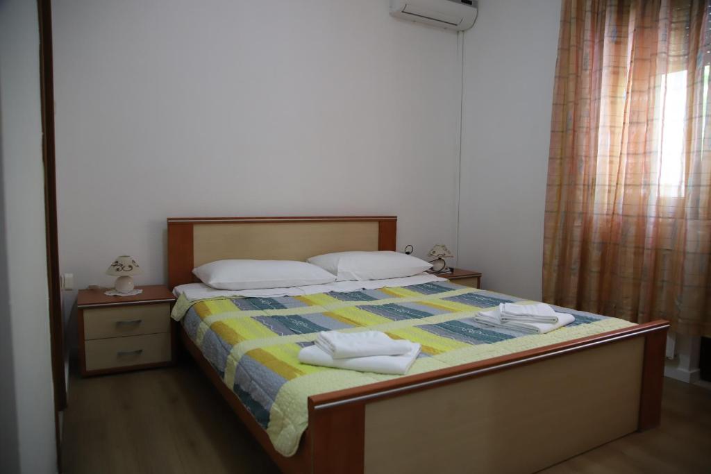 Posteľ alebo postele v izbe v ubytovaní Apartments Sustic