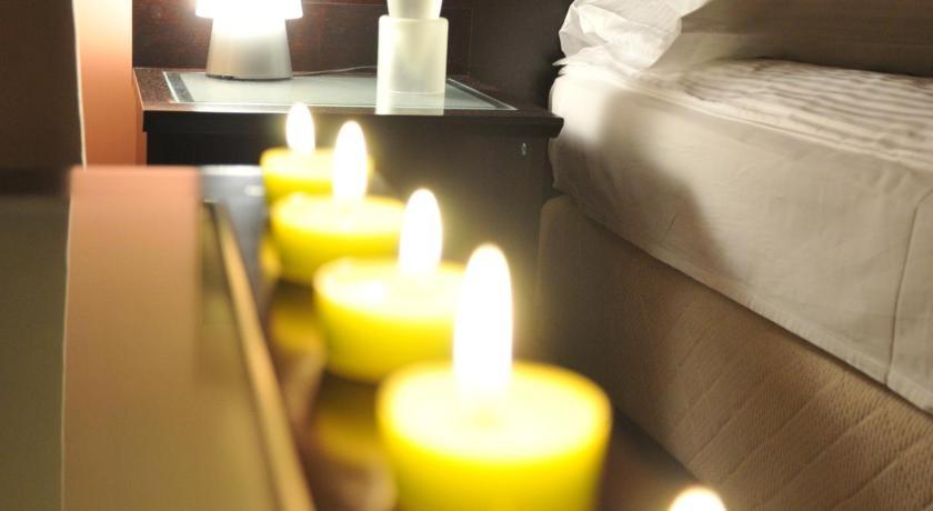 Postel nebo postele na pokoji v ubytování Hotel Beograd - Yu