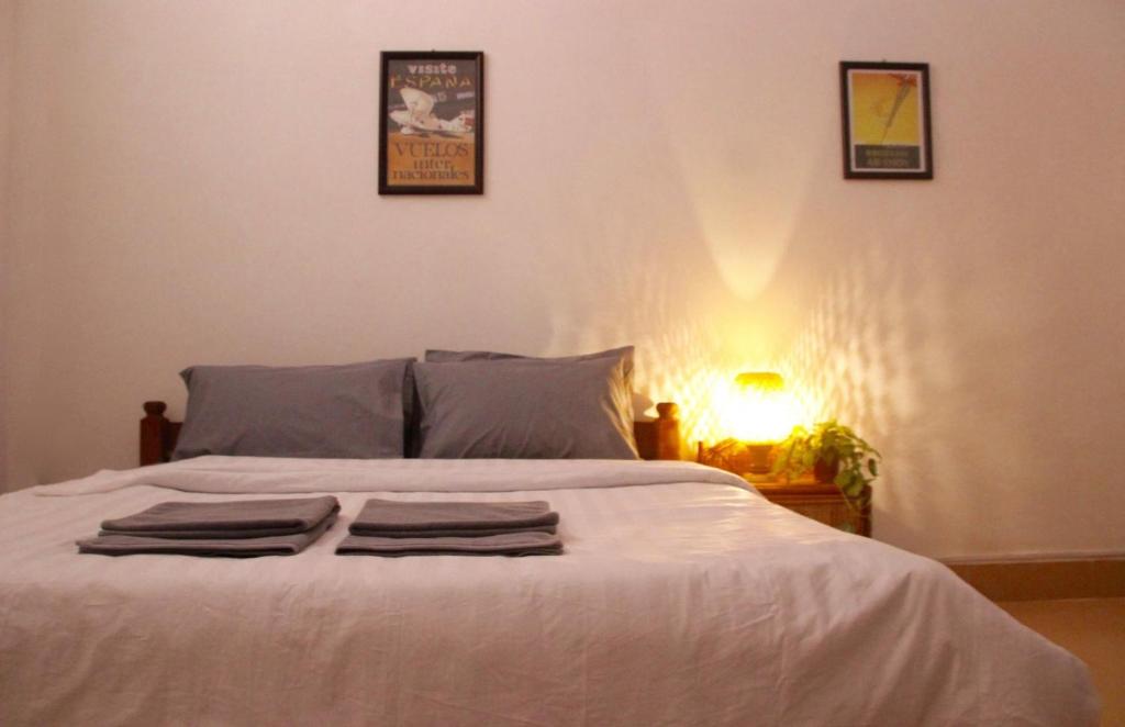 Postel nebo postele na pokoji v ubytování Sorya Guesthouse & Dolphin Tours