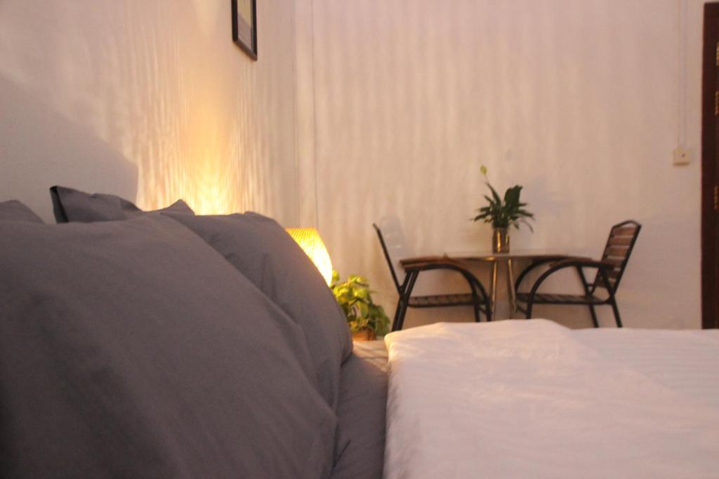 Postel nebo postele na pokoji v ubytování Sorya Guesthouse & Dolphin Tours