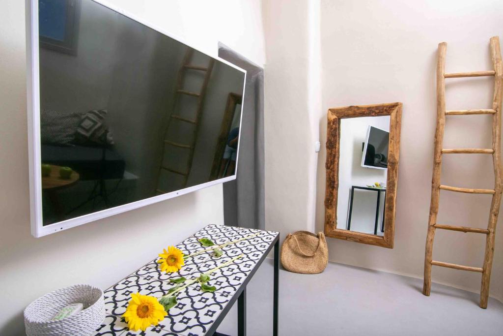TV o dispositivi per l'intrattenimento presso Santorini Villas