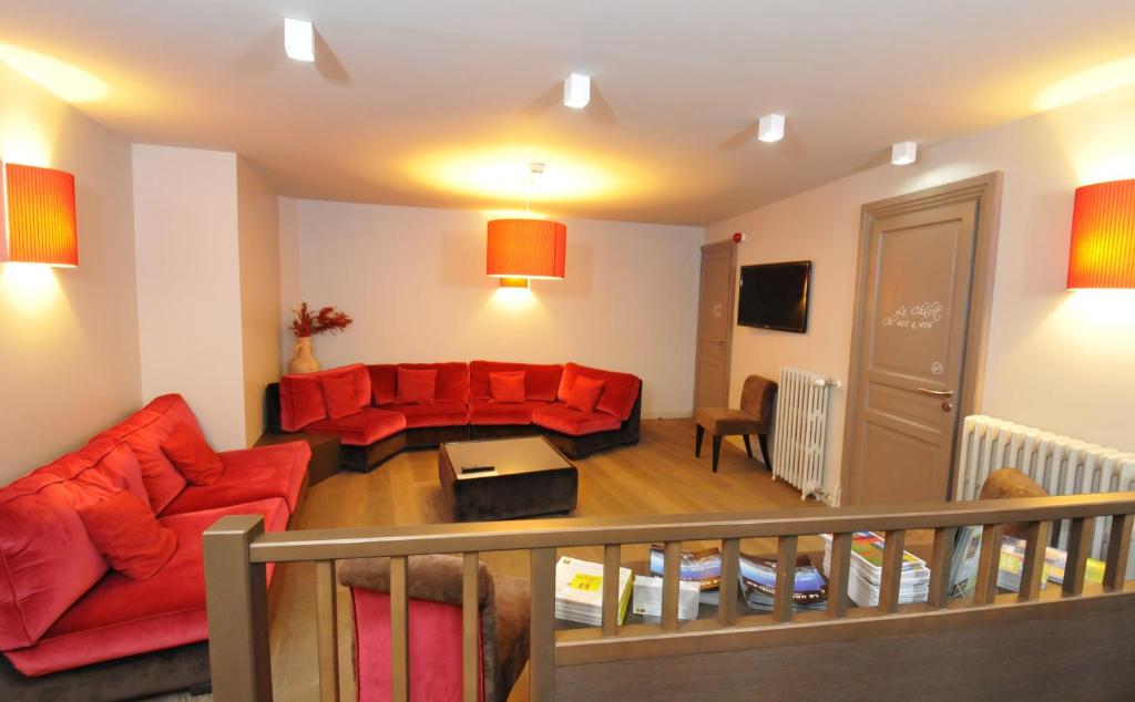 Posezení v ubytování Logis Hôtel Le Central