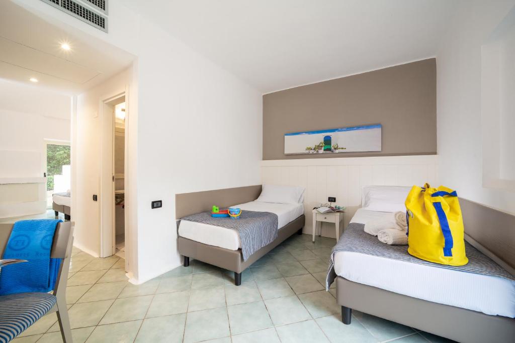 Postel nebo postele na pokoji v ubytování TH Ostuni - Ostuni Village