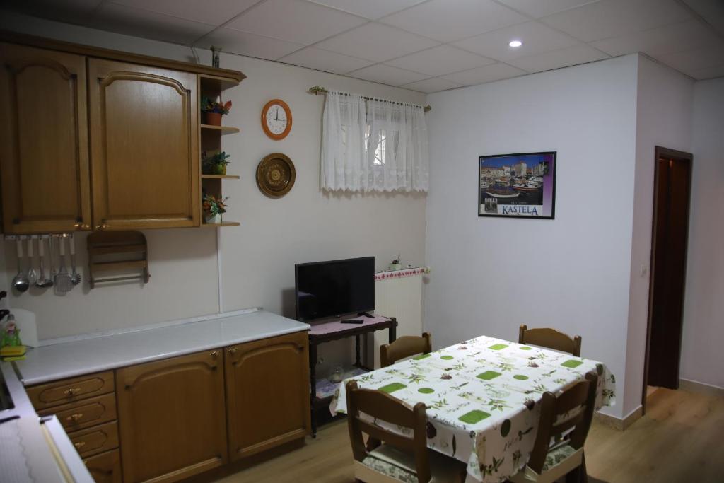 Kuchyňa alebo kuchynka v ubytovaní Apartments Sustic