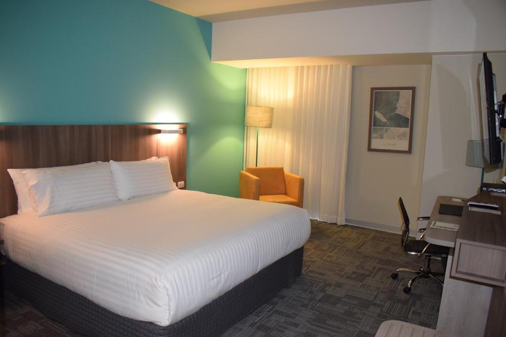 Postel nebo postele na pokoji v ubytování Holiday Inn - Lima Airport by IHG