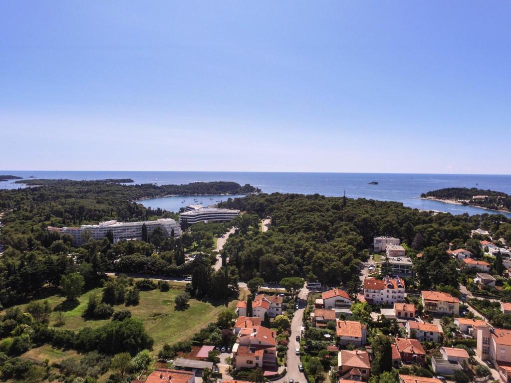 an aerial view of a city and the ocean at Apartments Medora in Rovinj
