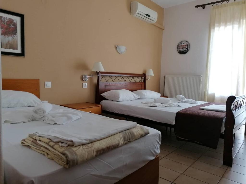 Postel nebo postele na pokoji v ubytování Vanta Hotel