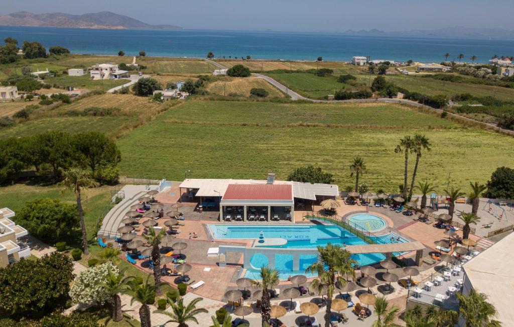 an aerial view of a resort with a swimming pool at Corali Hotel in Tigaki
