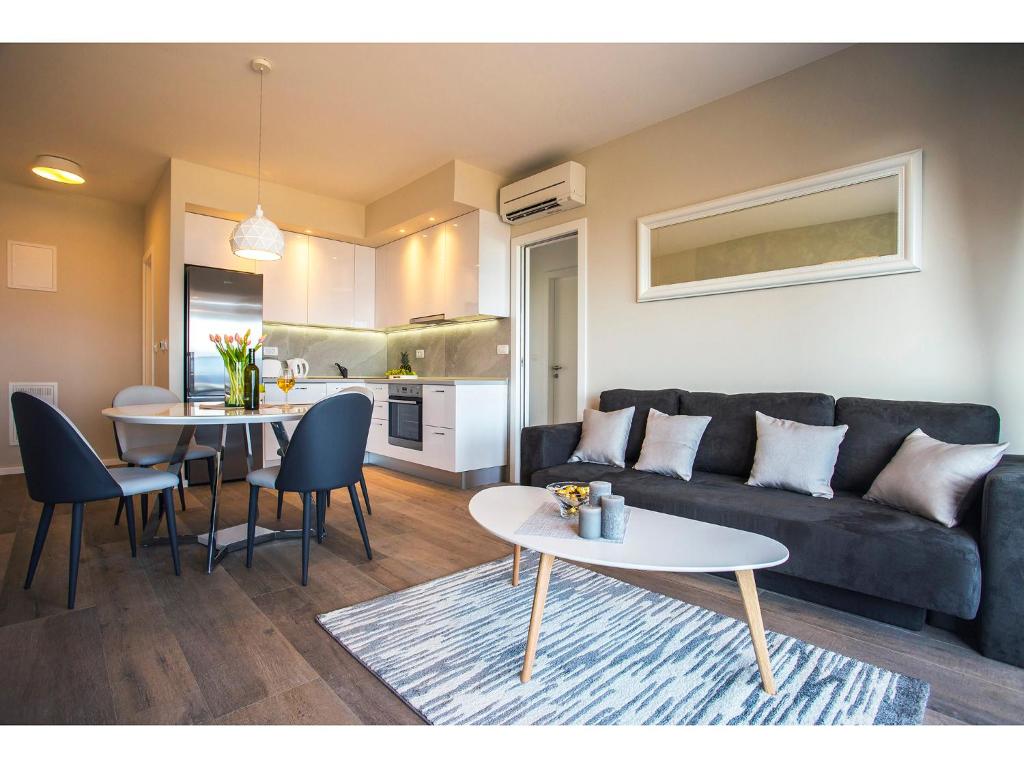 Kuchyň nebo kuchyňský kout v ubytování Uma Apartment