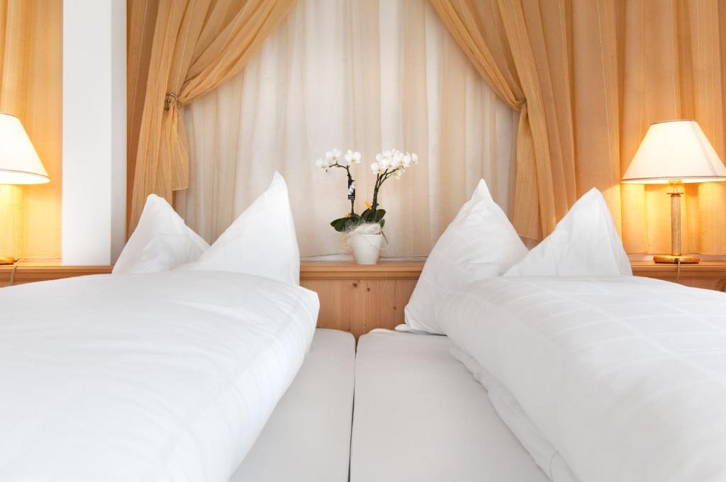 Voodi või voodid majutusasutuse Hotel Rotwand toas