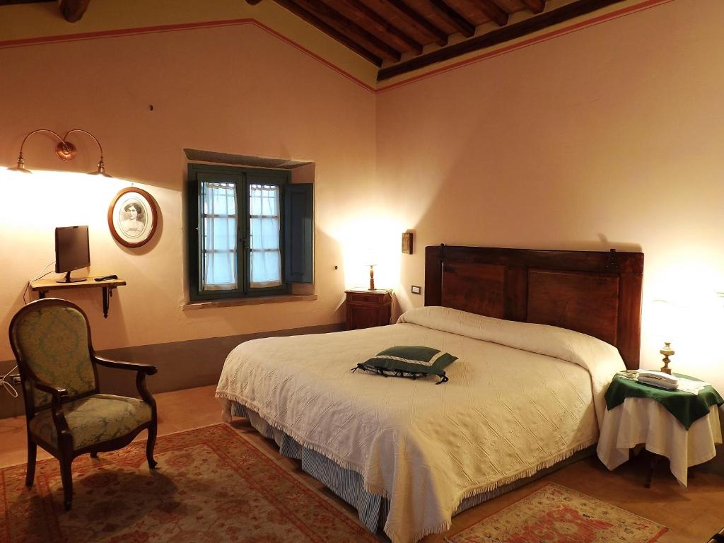 Postel nebo postele na pokoji v ubytování Cortona Resort-Le Terre Dei Cavalieri