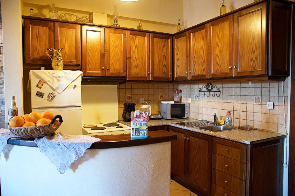 Kuchyň nebo kuchyňský kout v ubytování Aegean House