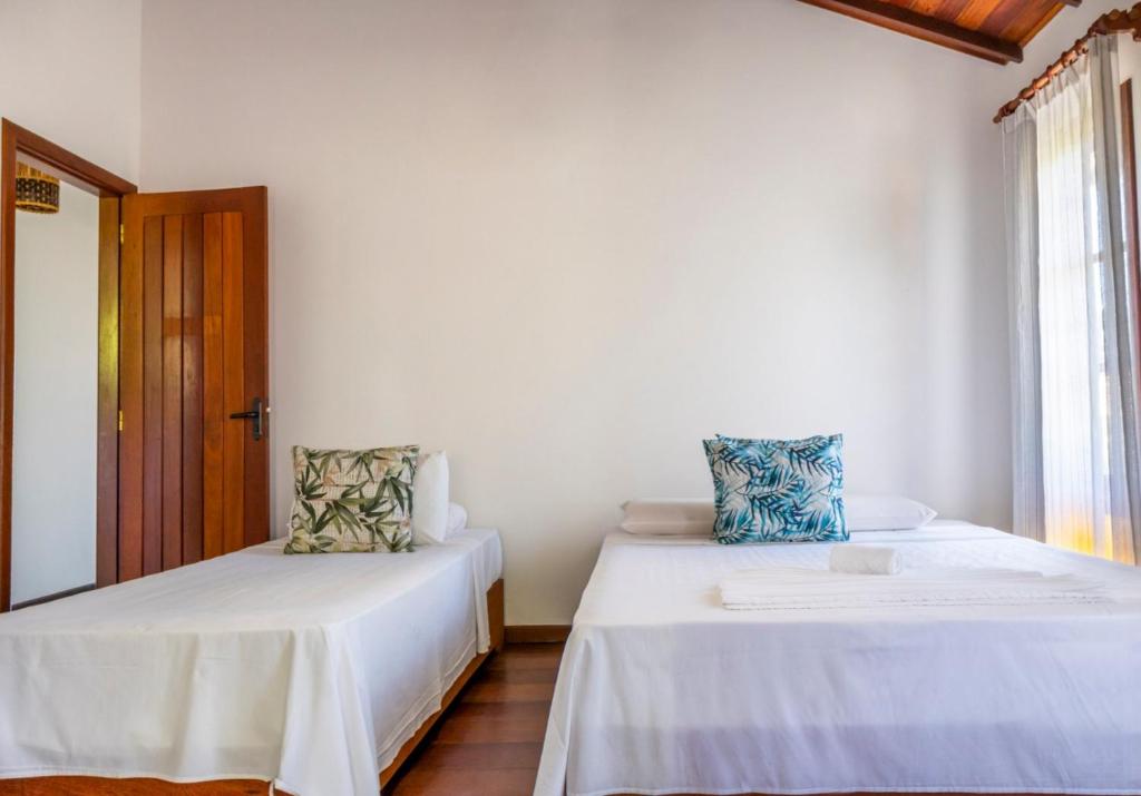 Postel nebo postele na pokoji v ubytování Mar Paraíso Hotel