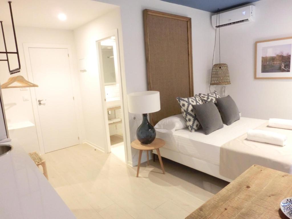 Postel nebo postele na pokoji v ubytování YOU & CO. Saler Beach Boutique