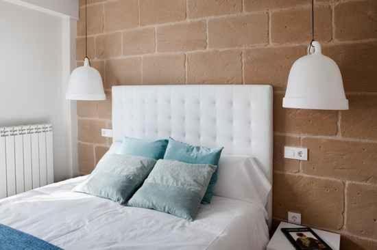 A bed or beds in a room at Apartamentos Turísticos Beethoven Haro