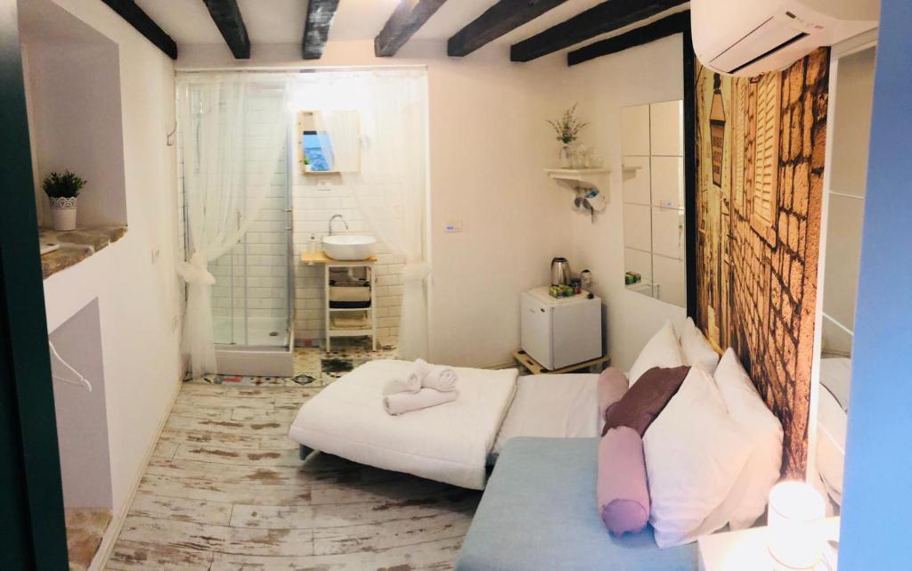 Postel nebo postele na pokoji v ubytování Peasant´s Palace