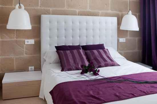 A bed or beds in a room at Apartamentos Turísticos Beethoven Haro