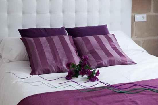 A bed or beds in a room at Apartamentos Turísticos Beethoven Haro