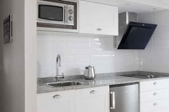 A kitchen or kitchenette at Apartamentos Turísticos Beethoven Haro