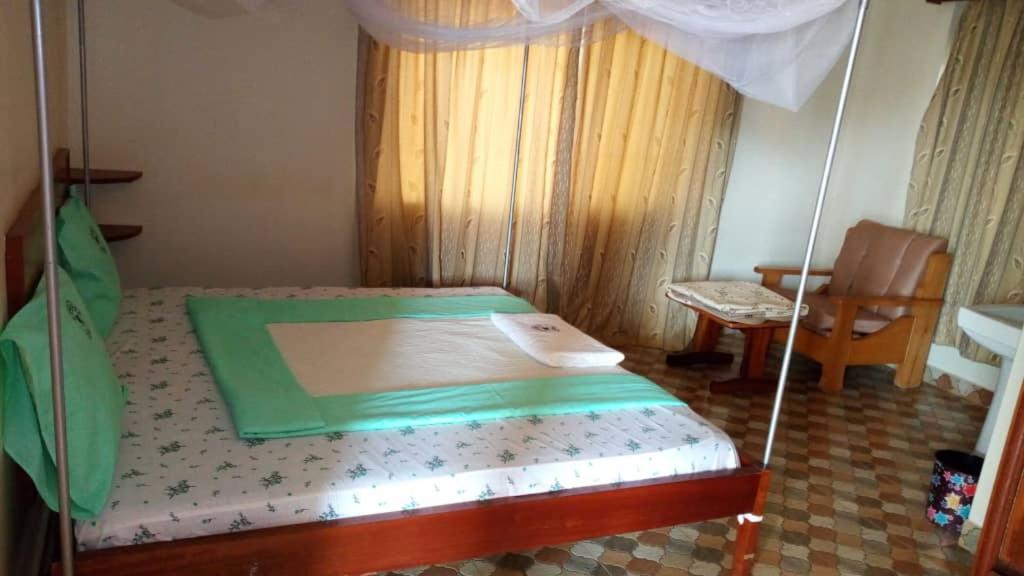 Postel nebo postele na pokoji v ubytování Kanberra Hotel