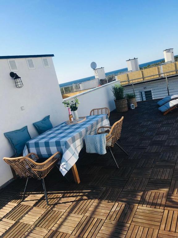 Balkón alebo terasa v ubytovaní Apartamenty Piaskowe B21 z tarasem na dachu