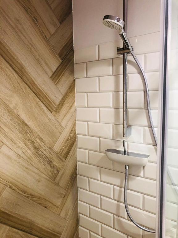 Kúpeľňa v ubytovaní Apartamenty Piaskowe B21 z tarasem na dachu