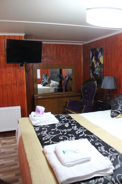 TV a/nebo společenská místnost v ubytování Hotel Forjadores del Cabo de Hornos