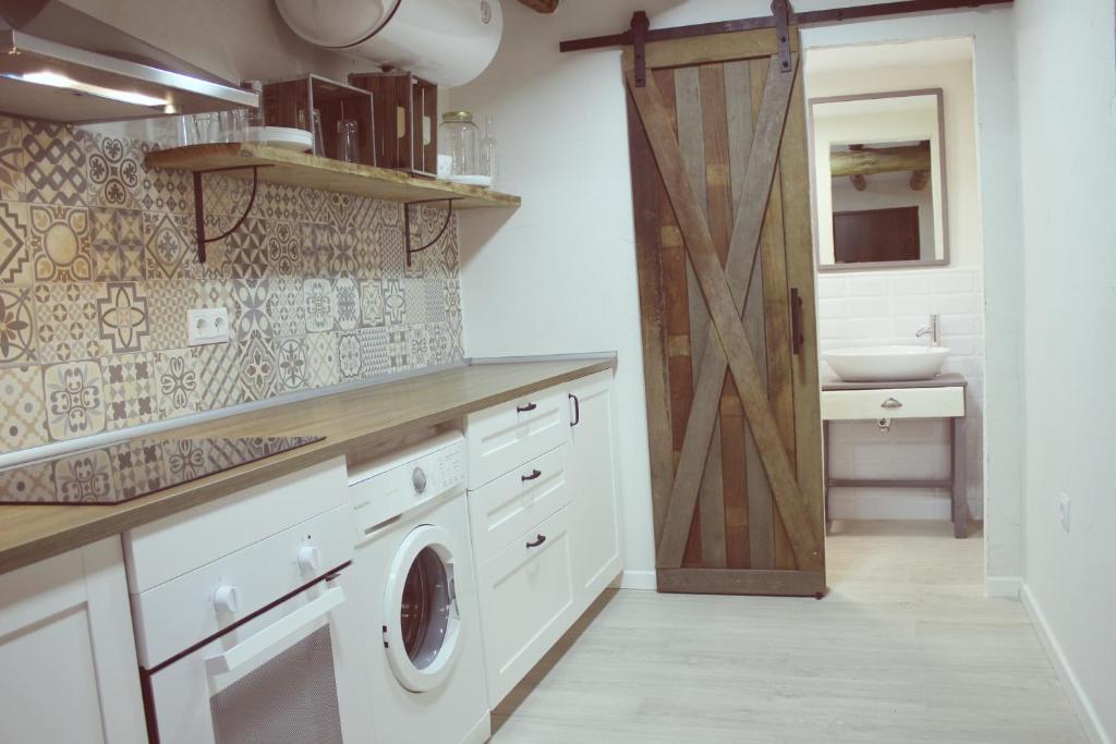 Una cocina o zona de cocina en Casa Rural Teresa