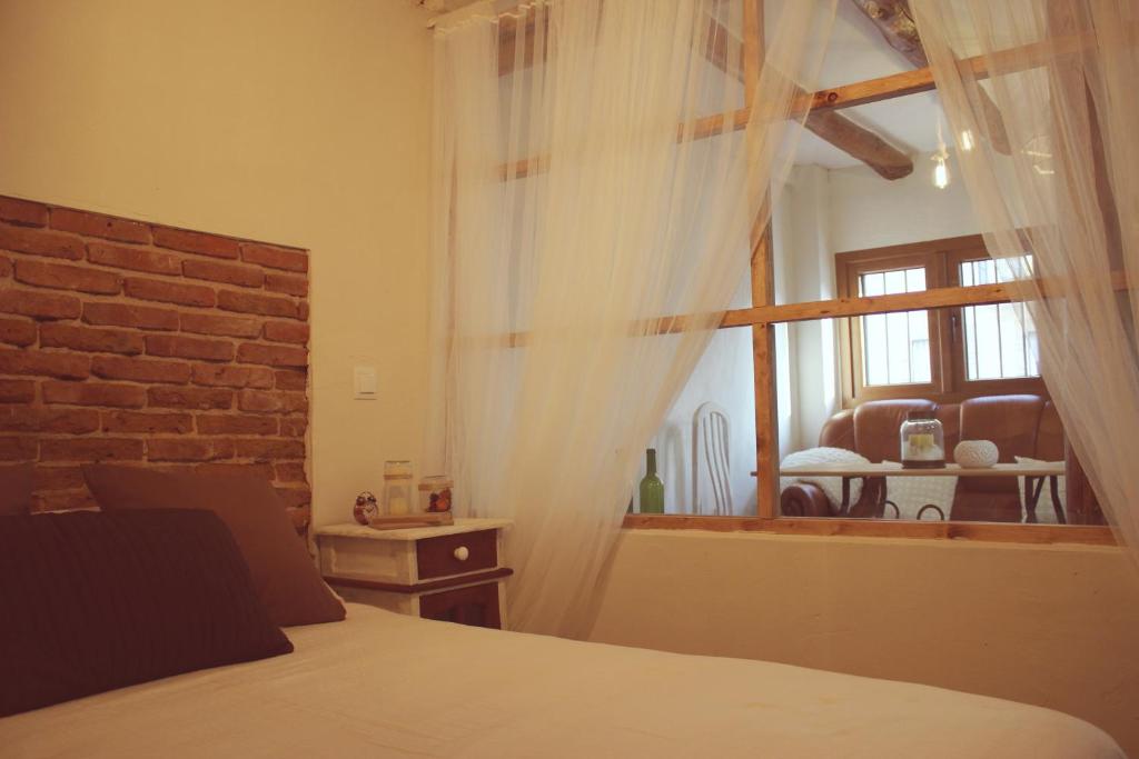 Cama o camas de una habitación en Casa Rural Teresa