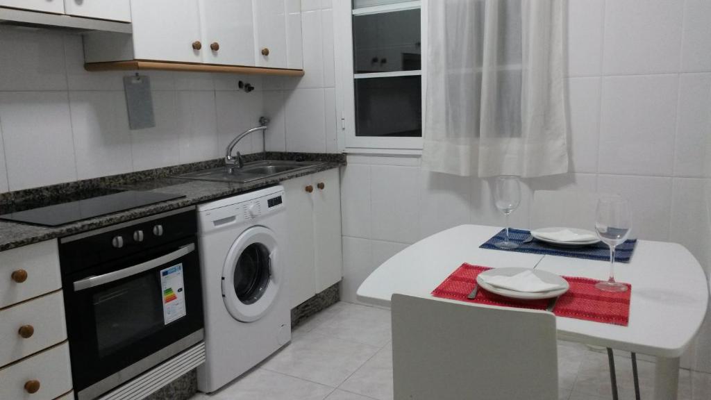 Kuchyň nebo kuchyňský kout v ubytování Apartamento en el casco histórico