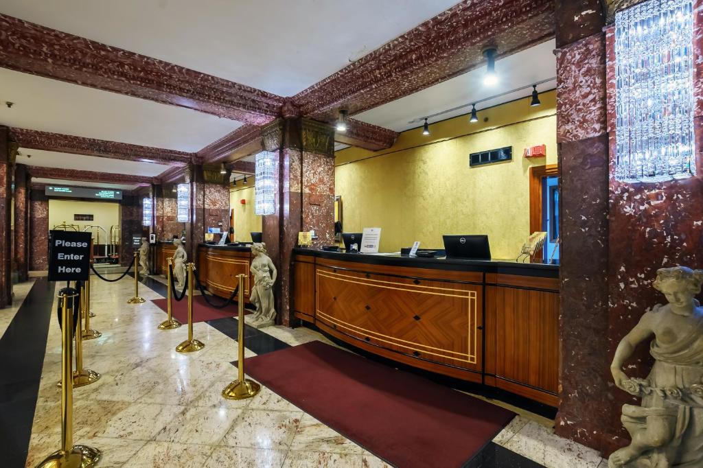 a lobby with a reception desk in a building at Congress Plaza Hotel Chicago in Chicago