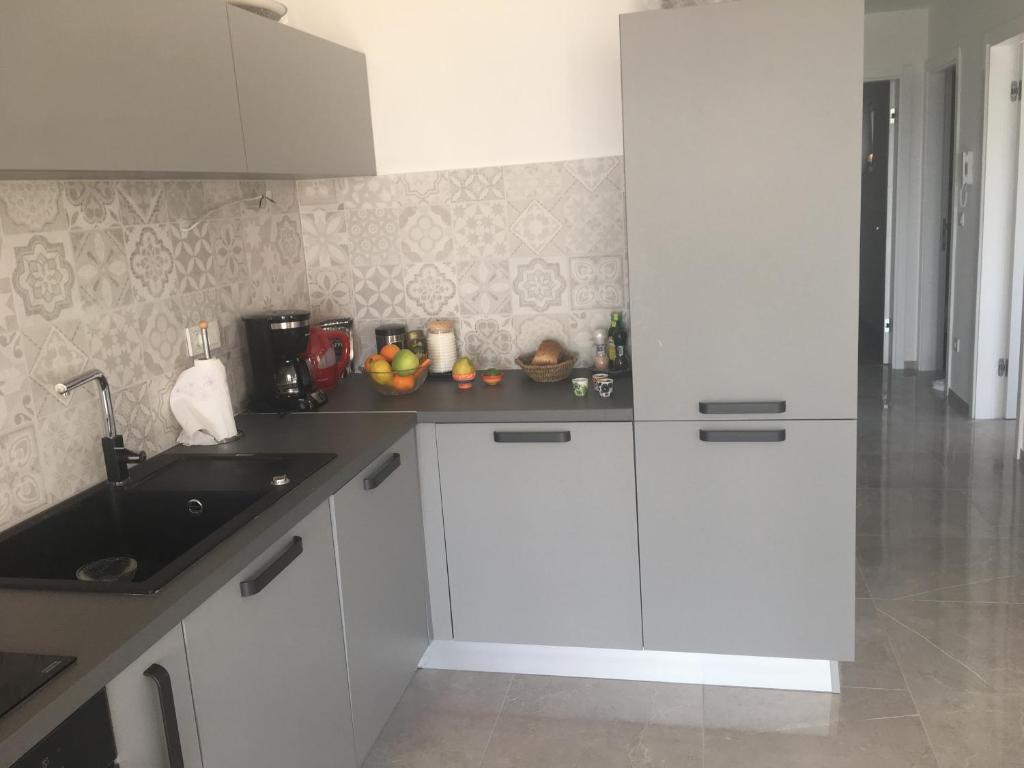 Kuchyň nebo kuchyňský kout v ubytování Villa Primosten