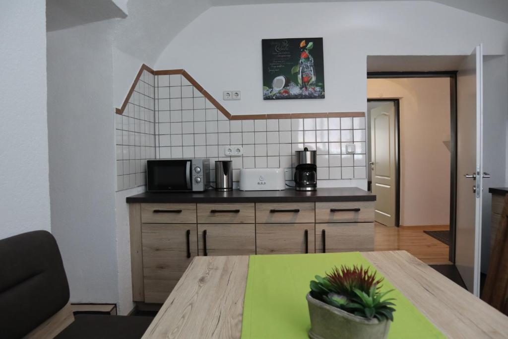 Kuchyň nebo kuchyňský kout v ubytování Ferienwohnung Lenz