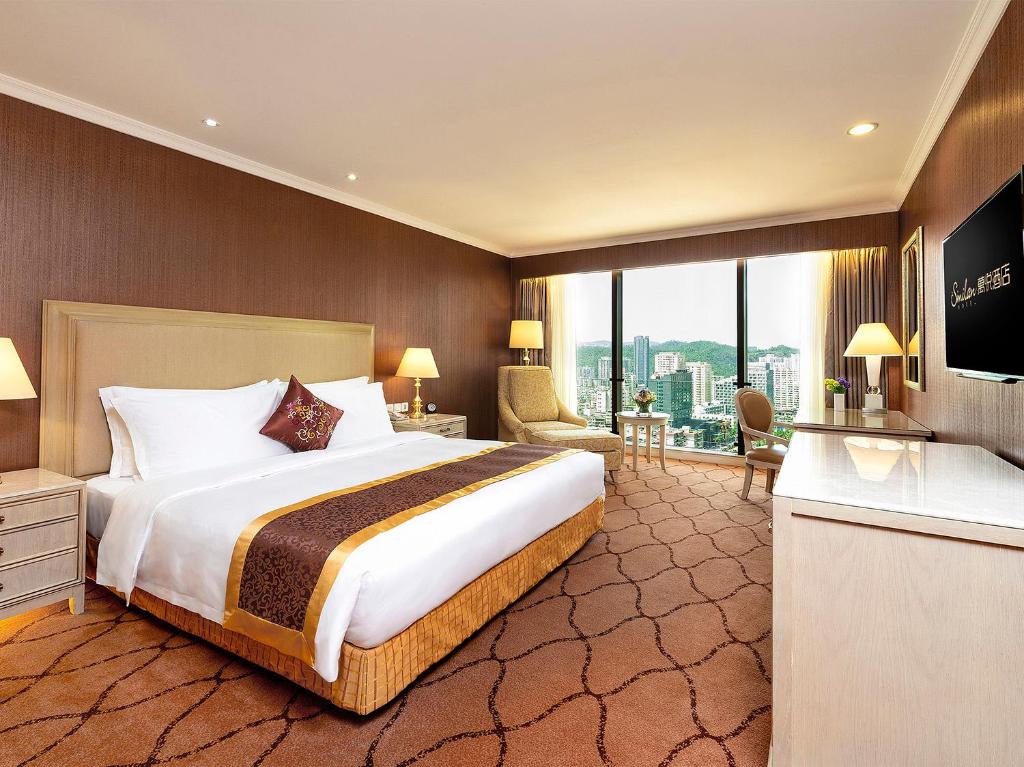 Postel nebo postele na pokoji v ubytování Similan Hotel Zhuhai-Gongbei Port