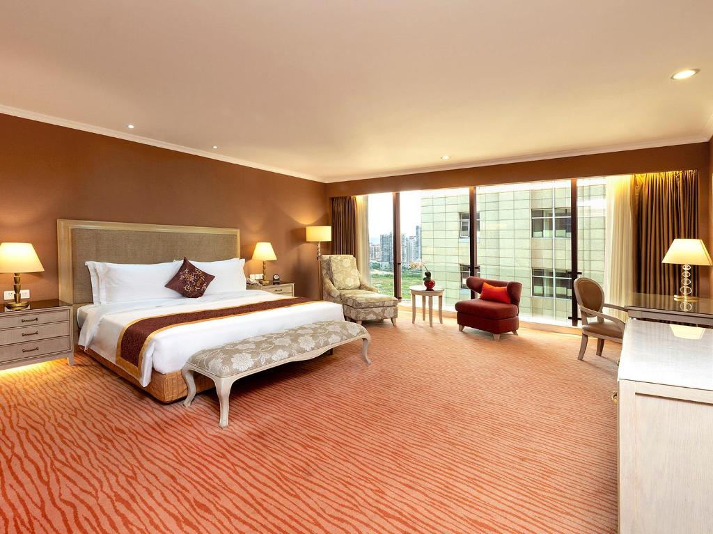 Postel nebo postele na pokoji v ubytování Similan Hotel Zhuhai-Gongbei Port