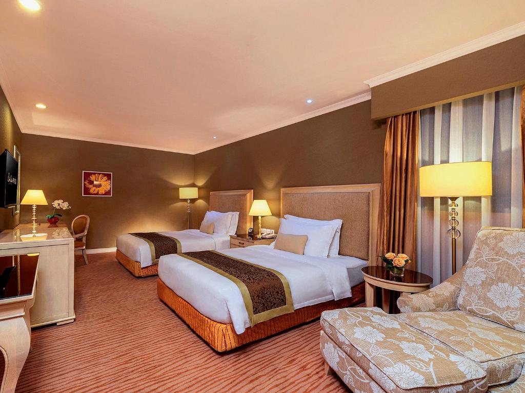 Postel nebo postele na pokoji v ubytování Similan Hotel Zhuhai-Gongbei Port