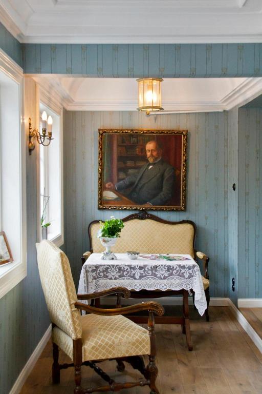 Postel nebo postele na pokoji v ubytování Hotel Kong Carl - Unike Hoteller