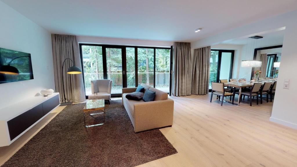 TV a/nebo společenská místnost v ubytování White Pearl Apartment 0.05