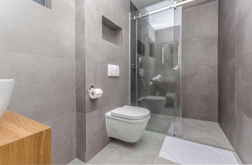 Kúpeľňa v ubytovaní Apartments Villa Adriana II