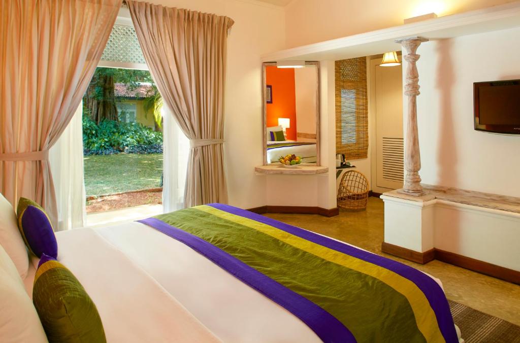 Postel nebo postele na pokoji v ubytování Hotel Sigiriya