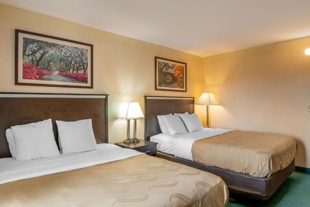 Postel nebo postele na pokoji v ubytování Quality Inn