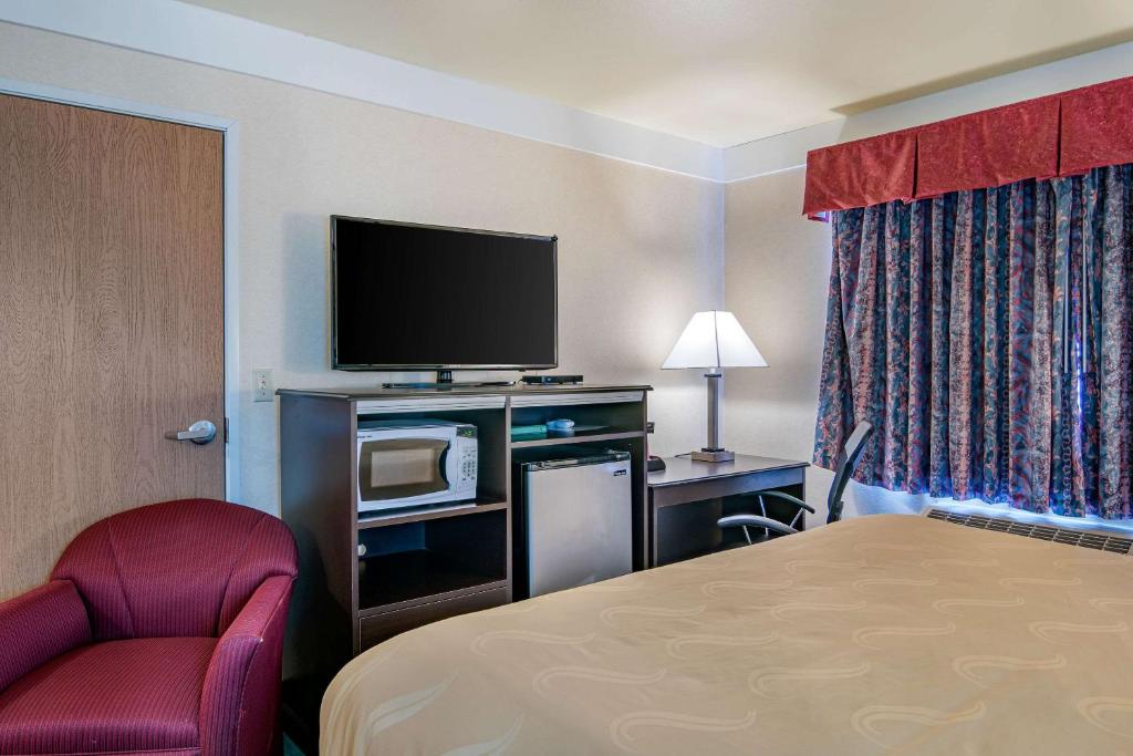 Postel nebo postele na pokoji v ubytování Quality Inn