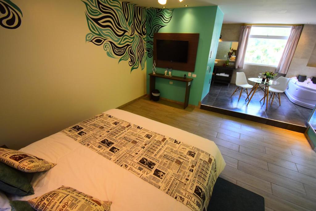 Postel nebo postele na pokoji v ubytování Monte Selva Hotel Spa Termal