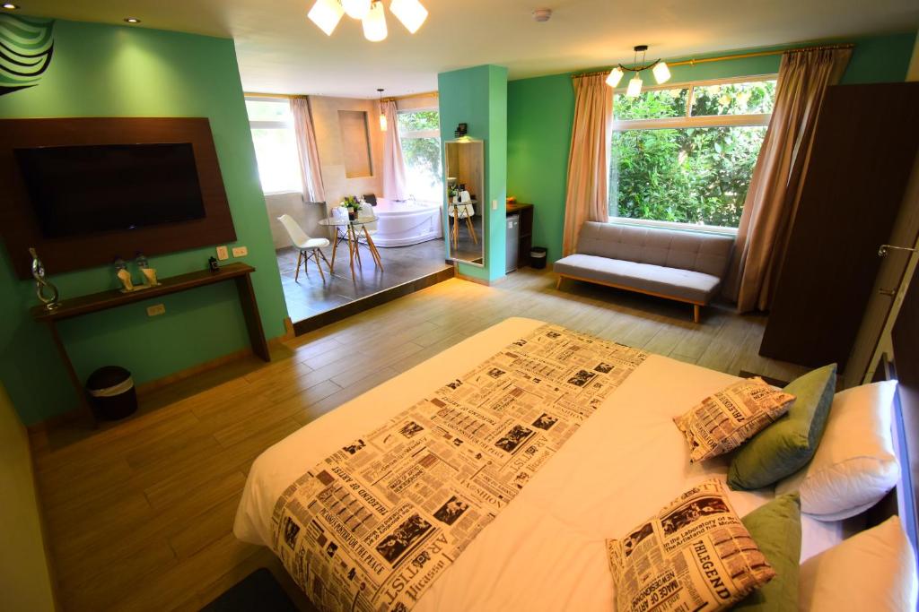 Postel nebo postele na pokoji v ubytování Monte Selva Hotel Spa Termal